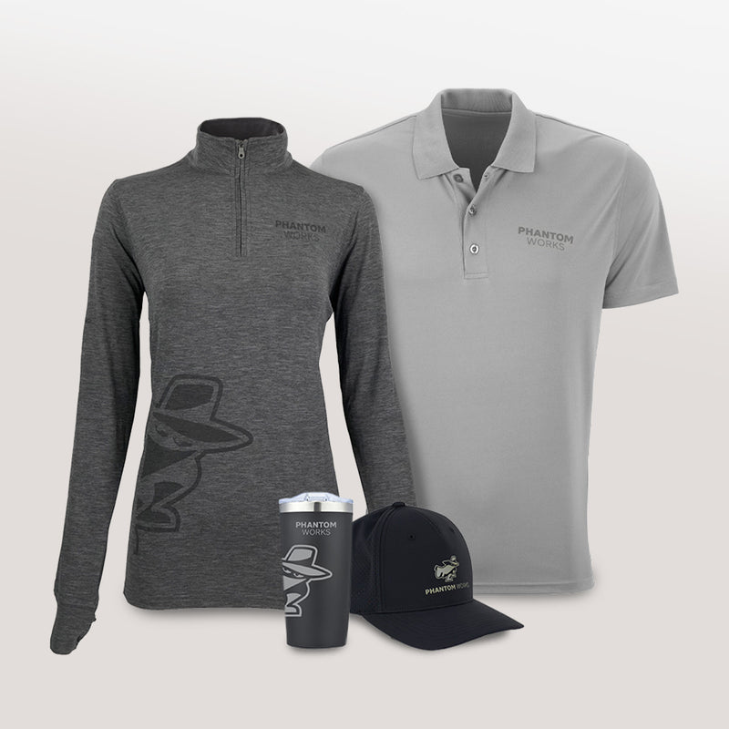 Gray long-sleeve shirt, gray polo shirt, black cap, and black tumbler with 'Phantom Works' logo and Graphic on a light gray background.