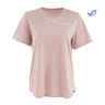 The Glyder Boeing Women’s Do No Harm T-Shirt by BOEING is a light pink, organic cotton short-sleeve tee featuring a small white Boeing logo on the left chest and an eco-friendly leaf icon in the upper right corner.