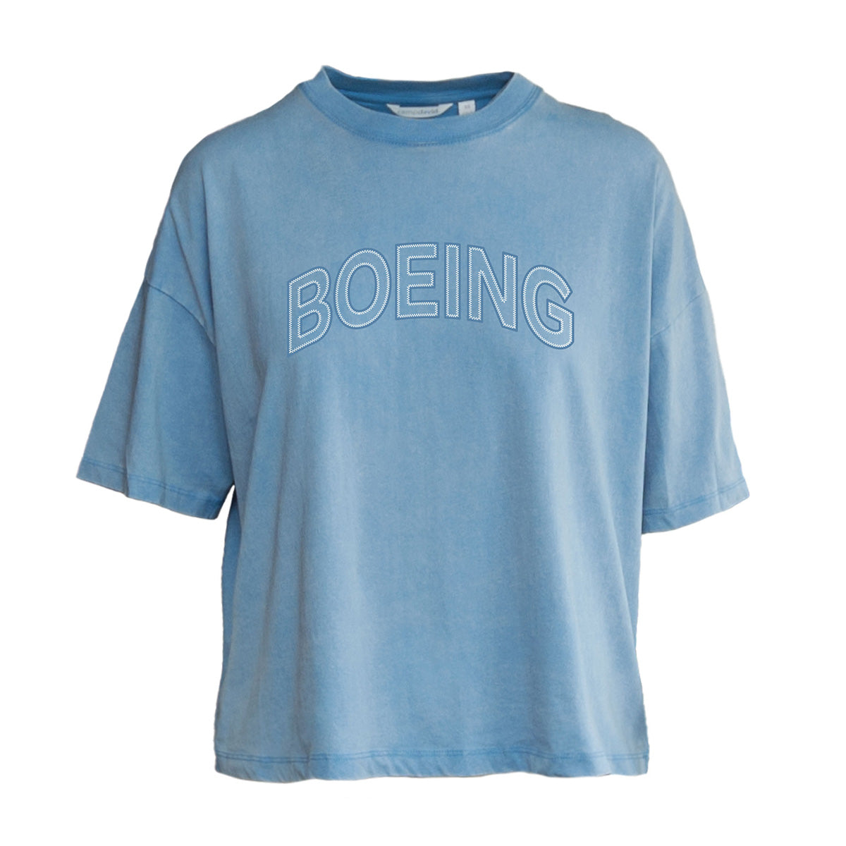The Boeing Women's Boardwalk T-Shirt by BOEING is a light blue, loose-fitting cotton jersey tee with a comfortable boyfriend fit and bold white outlined "BOEING" lettering across the chest.