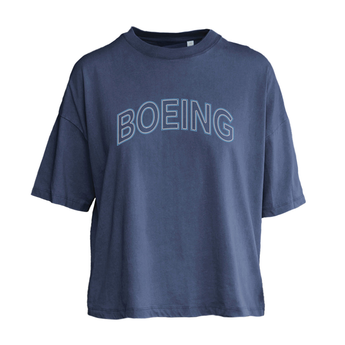 The Boeing Women's Boardwalk T-Shirt by BOEING features a loose, boyfriend fit in navy cotton jersey with "BOEING" in large, outlined capitals across the chest. Displayed on a plain white background.