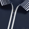 Close up of the zipper and collar. navy polo