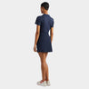 Back View Lifestyle of G/FORE Women's Ribbed Tech Polo in Navy