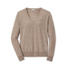The Peter Millar Boeing Women’s Excursionist Flex V-Neck Sweater by BOEING is a light brown merino wool piece with long sleeves and subtle stitching, featuring an embroidered logo on the left chest. Shown laid flat on a white background.