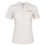 The Boeing Women's Signature Logo Pro Crossroads Polo by BOEING is a white, short-sleeve shirt with a subtle geometric pattern, three-button collar, moisture-wicking fabric, and an orange Boeing logo on the left chest.
