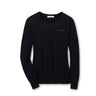 The Peter Millar Boeing Womens Excursionist Flex Crew by The Boeing Store is a black cashmere long-sleeve sweater with a round neckline and a subtle embroidered logo on the upper left chest, offering luxury knit comfort.