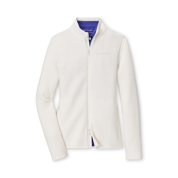 The Boeing Peter Millar Women’s Lumi-Knit Performance Full-Zip jacket is white with a high collar, subtle chest logo, four-way stretch, and light blue lining. Shown against a plain white background.
