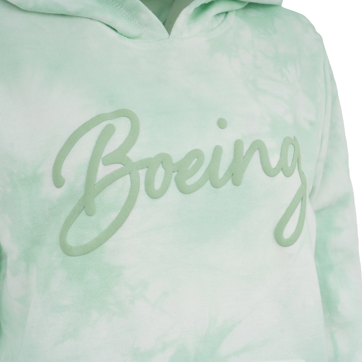 The Boeing Script Logo Womens Starburst Hoodie by Boeing features a light green tie-dye design and a large cursive Boeing script logo across the chest.