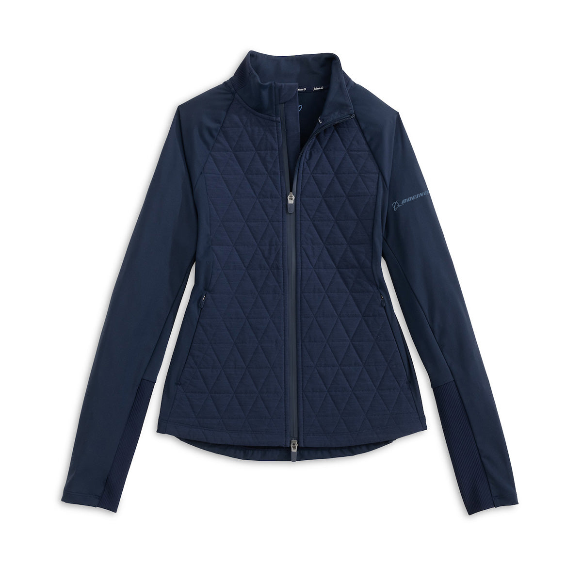 The johnnie-O Boeing Women’s Hannah Mixed Media Performance Jacket by BOEING is navy blue with long sleeves, quilted front panels, smooth fabric sleeves, zippered side pockets, and a subtle logo on the left sleeve.