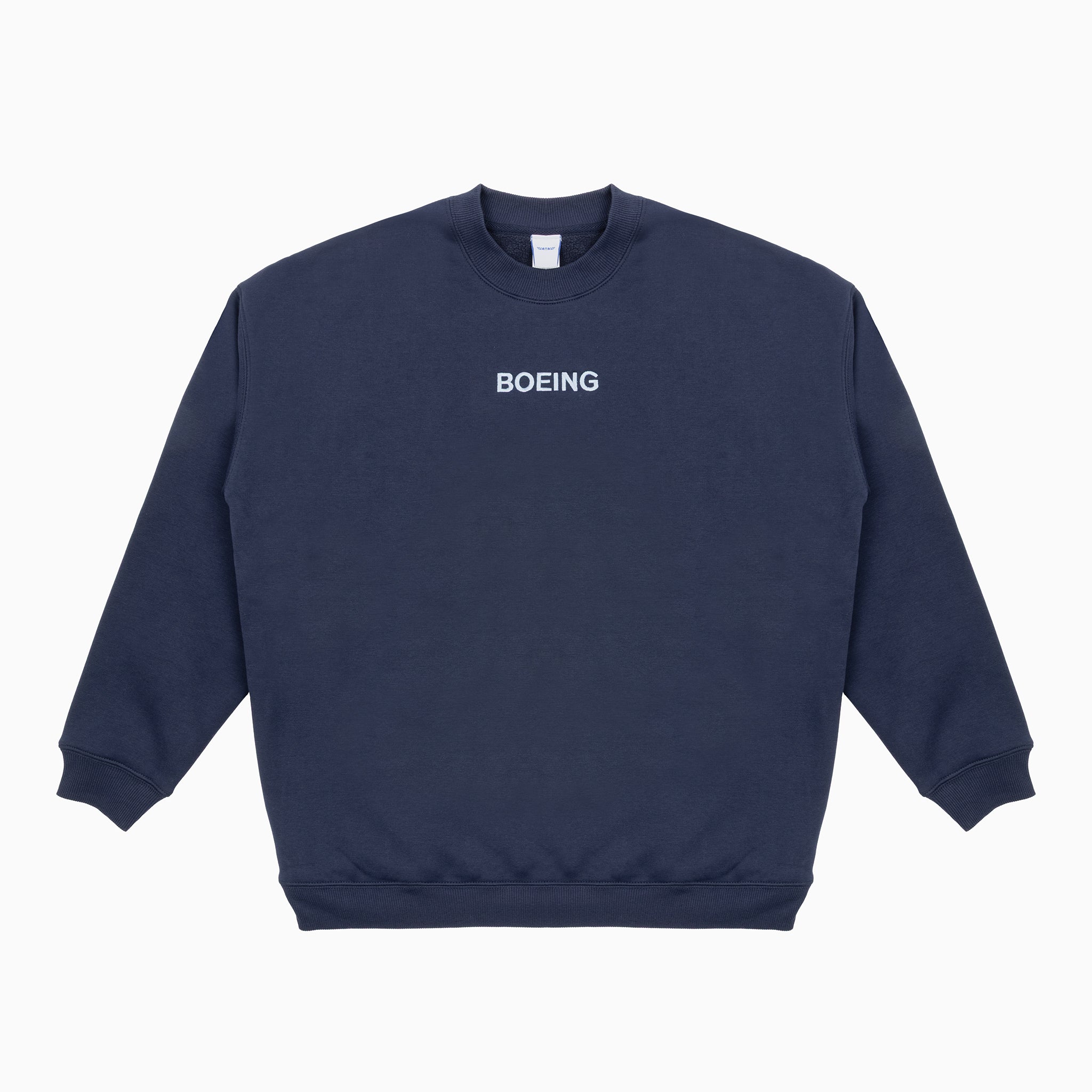 The Boeing Women's Drop Shoulder Crewneck Sweatshirt features bold white BOEING embroidery on the navy blue front, shown in a missy fit style against a white background.