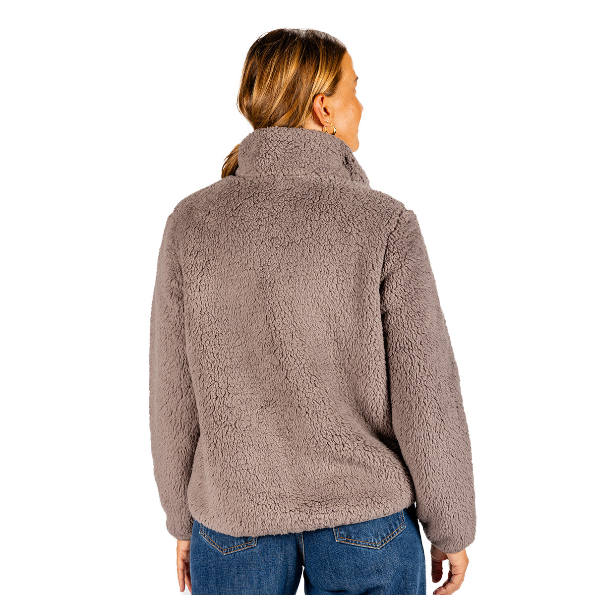 Back view of a person wearing a taupe Boeing Women’s Sierra Sherpa Pile Jacket featuring a zip-up front and a Boeing logo.