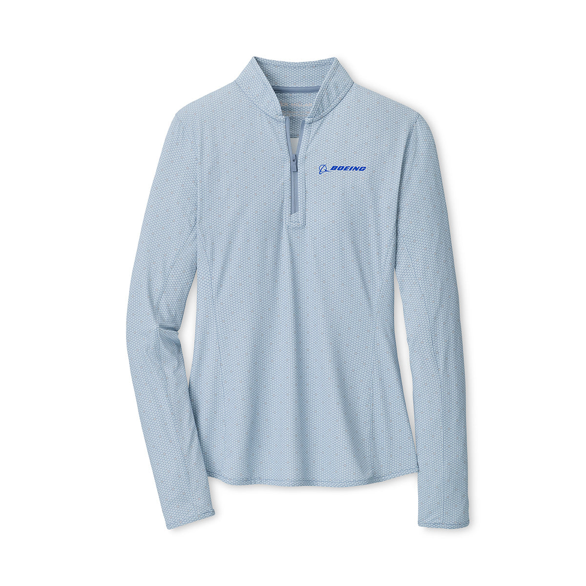 The Peter Millar Boeing Women’s Shadebreak Brook Quarter-Zip Sun Shirt features a light blue color with a subtle pattern, long sleeves, and a blue Boeing logo on the left chest. This premium BOEING sunshirt provides UPF 50+ protection for comfort indoors or outdoors and is shown laid flat on a white background.