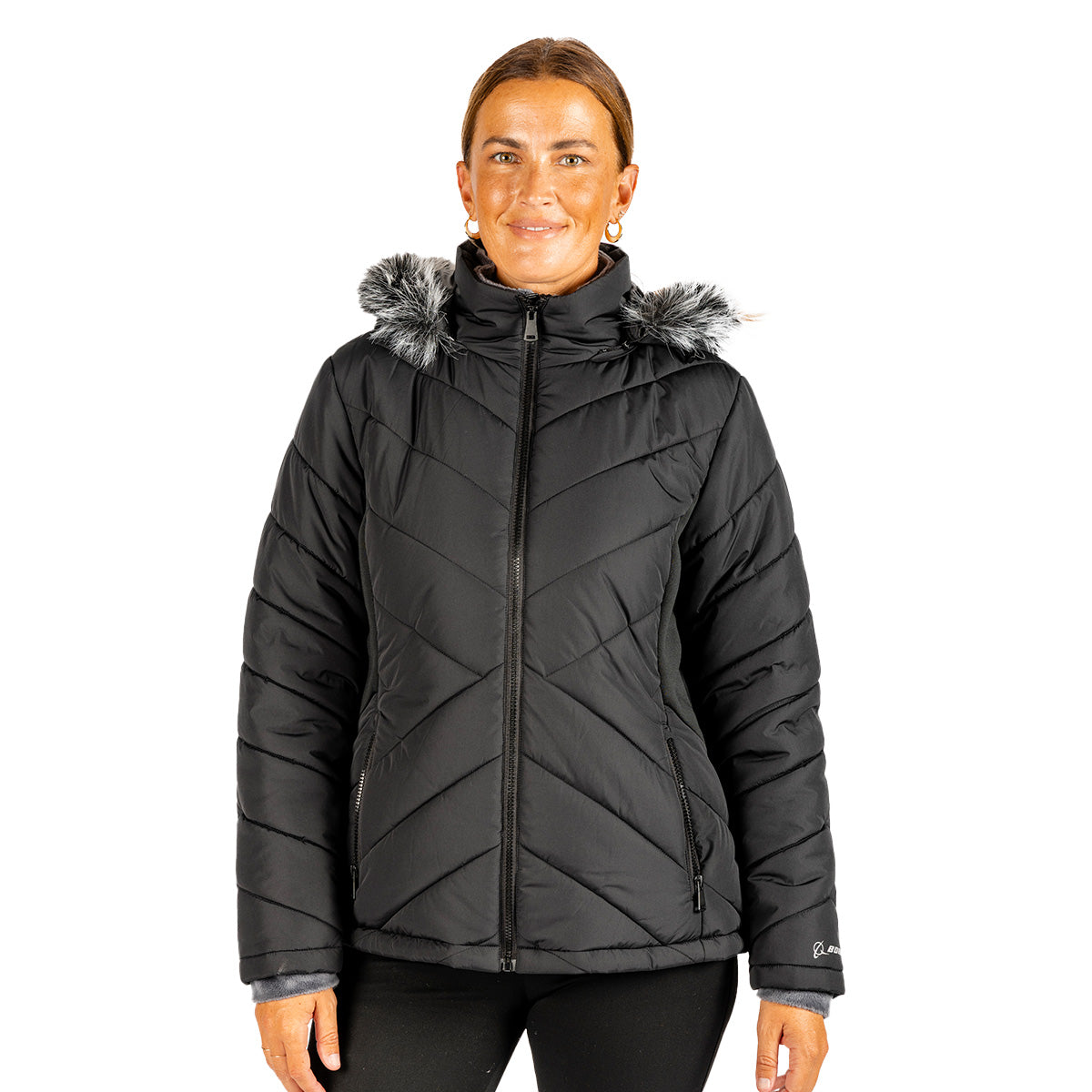A woman wearing a black, water-resistant Boeing Women’s Hybrid Puffer Jacket featuring a zip-up front and a faux-fur trimmed hood.