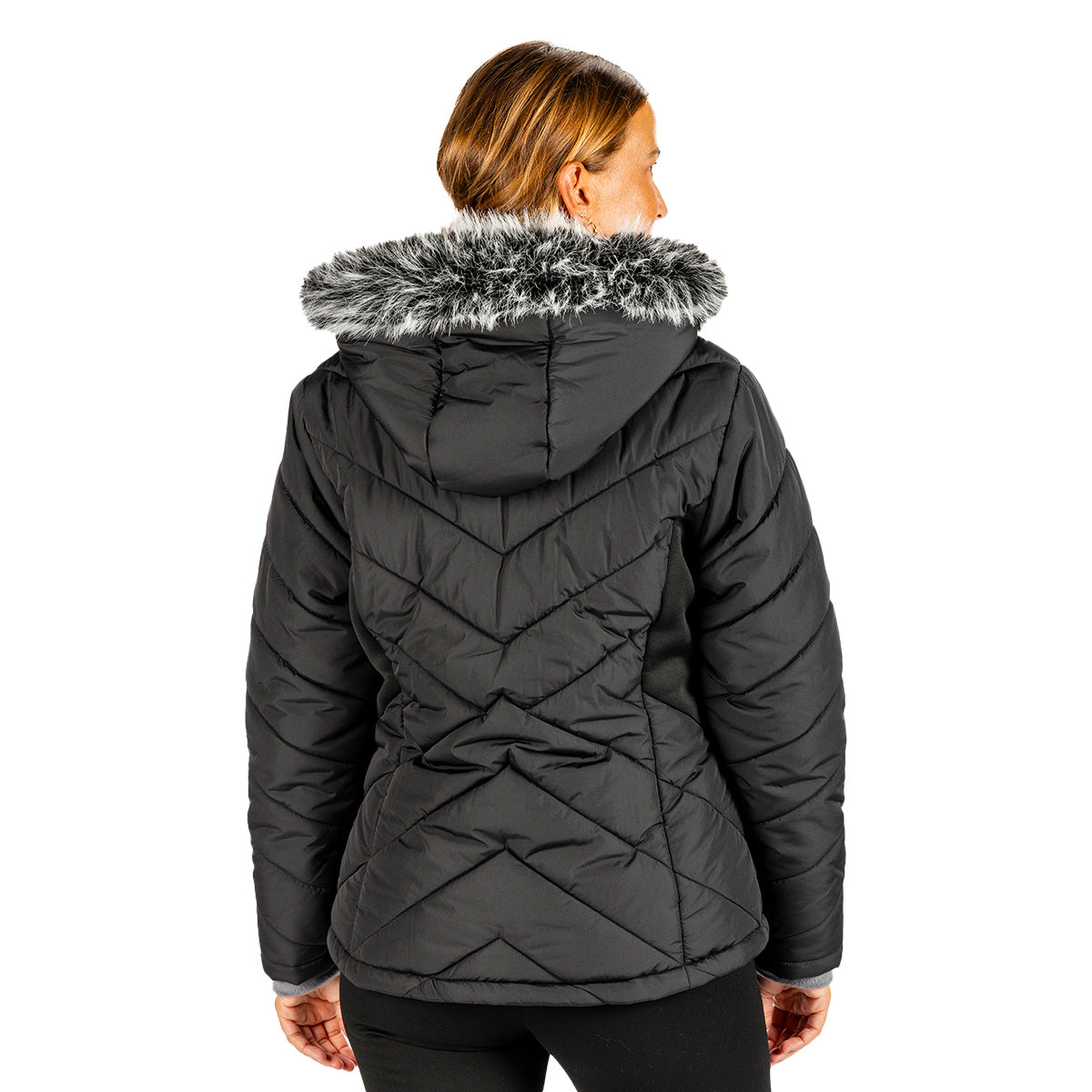 Back view of a woman wearing a black, water-resistant Boeing Women’s Hybrid Puffer Jacket with a quilted design and a fur-trimmed hood.