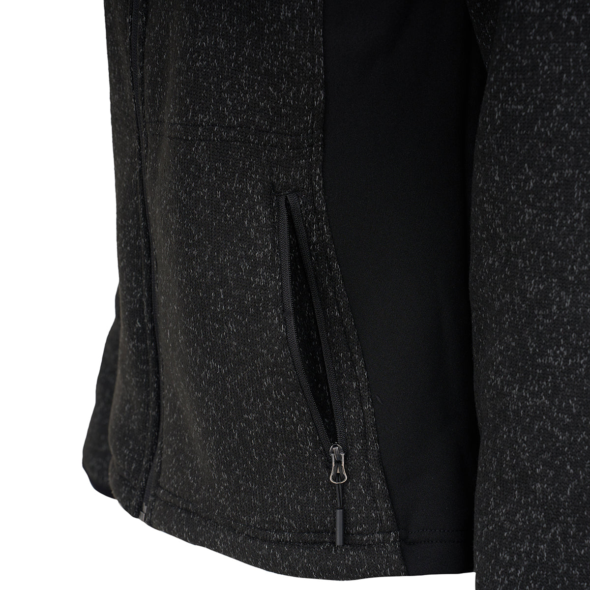 Close-up of the Boeing Women's Mountain Fleece Jacket by BOEING, showcasing soft black fleece with a subtle speckled pattern, a partially open zippered side pocket, and sleek power stretch panels for enhanced comfort.
