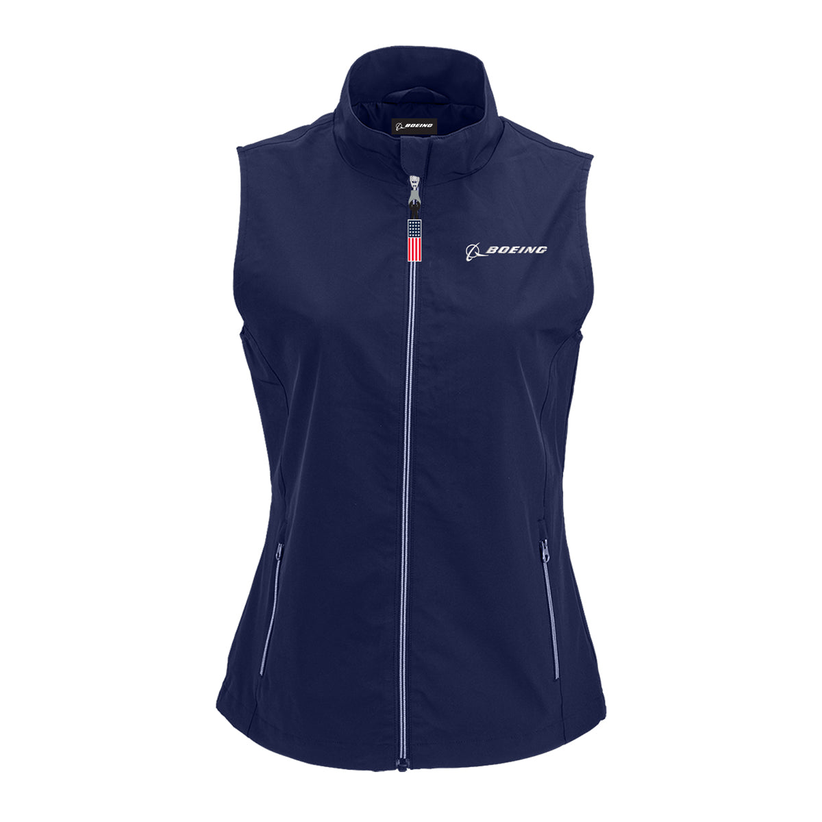 The Boeing Americana Women’s Lightweight Vest by BOEING features a navy blue, sleeveless design with a zip front, American flag pull tab, zippered pockets, and a Boeing logo on the left chest for subtle patriotic style.