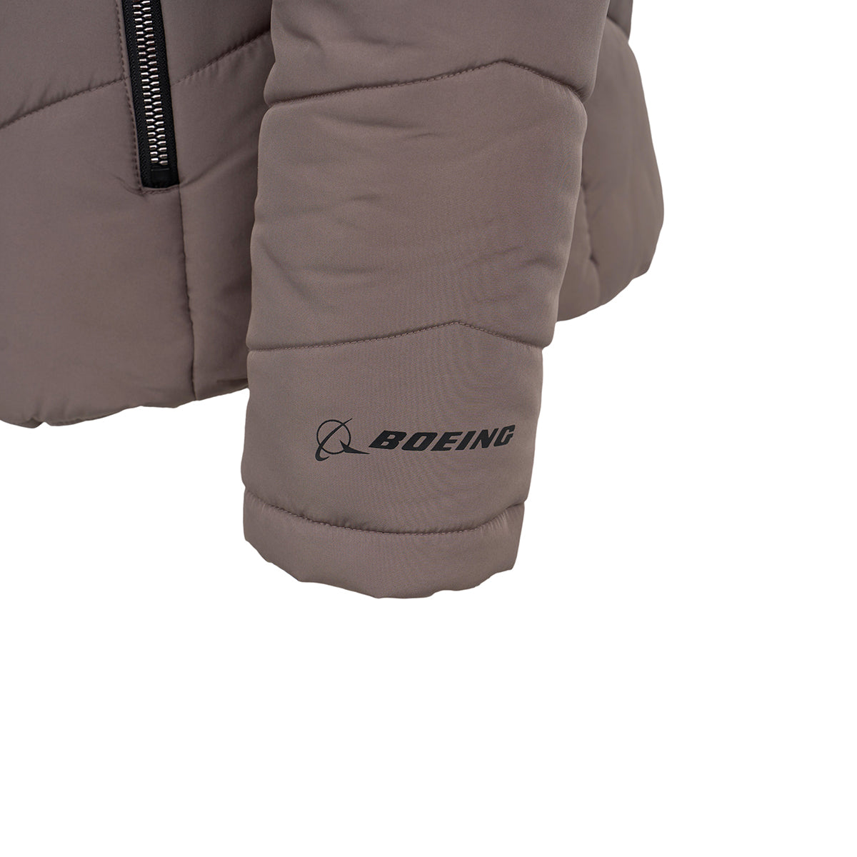 Close-up of the Boeing Women's Quilted Butterpile Jacket sleeve in gray, featuring a black zipper and the BOEING logo printed in black near the wrist, designed for wind resistance.