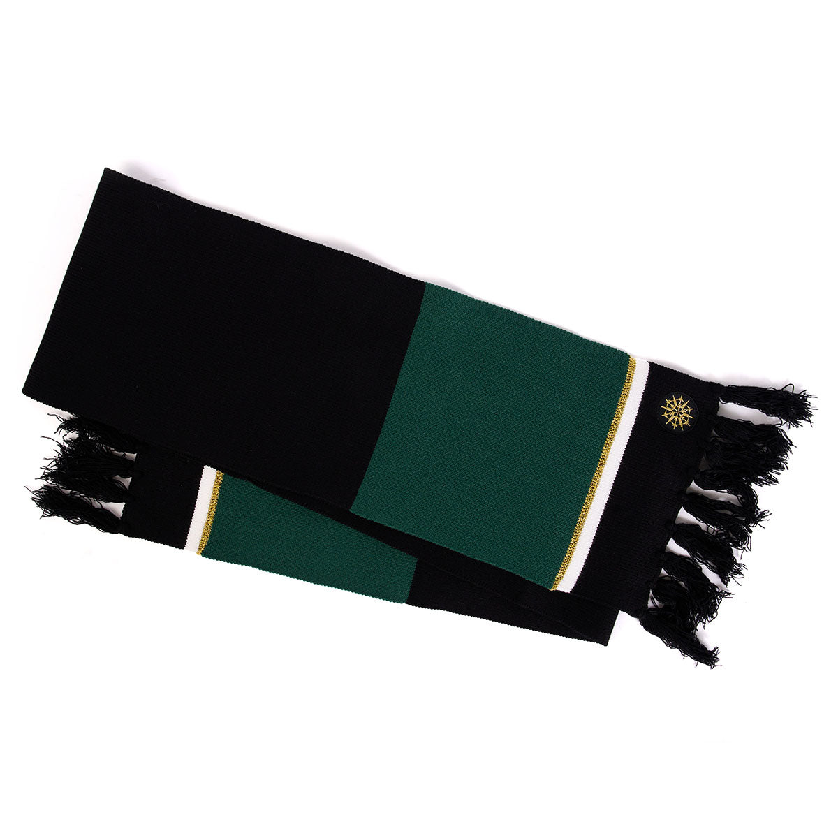 The Boeing 2023 Jet Snowflake Scarf by Boeing features black and green sections, gold and white stripes, black fringed ends, and a gold embroidered emblem inspired by the 787 Dreamliner—a Boeing exclusive accessory.