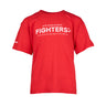 The Boeing Fighters Youth T-Shirt by Boeing is a red tee with Air Dominance Fighters in bold white text and a list of jet models—F-15, F/A-18, EA-18G, F-22, F-16—on the back. Shown against a plain white background.