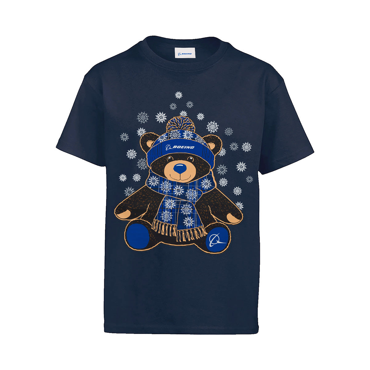 Introducing the Boeing 2026 Jet Snowflake Kids’ T-Shirt by BOEING—a navy blue tee showcasing a teddy bear in a blue winter hat and scarf, surrounded by white snowflakes. Both the bear and hat proudly feature the Boeing logo, making this aviation-themed shirt an ideal choice for young fans of flight.