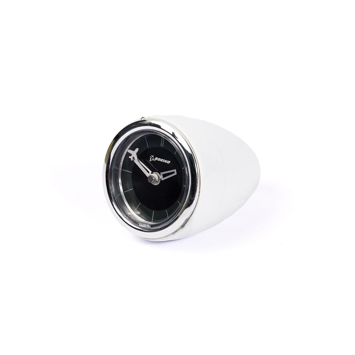 The Boeing Airplane Engine Desktop Clock by Boeing features a black face, silver rim, and Boeing logo, set in a white rounded holder that resembles an airplane engine and is angled slightly right on a white background.