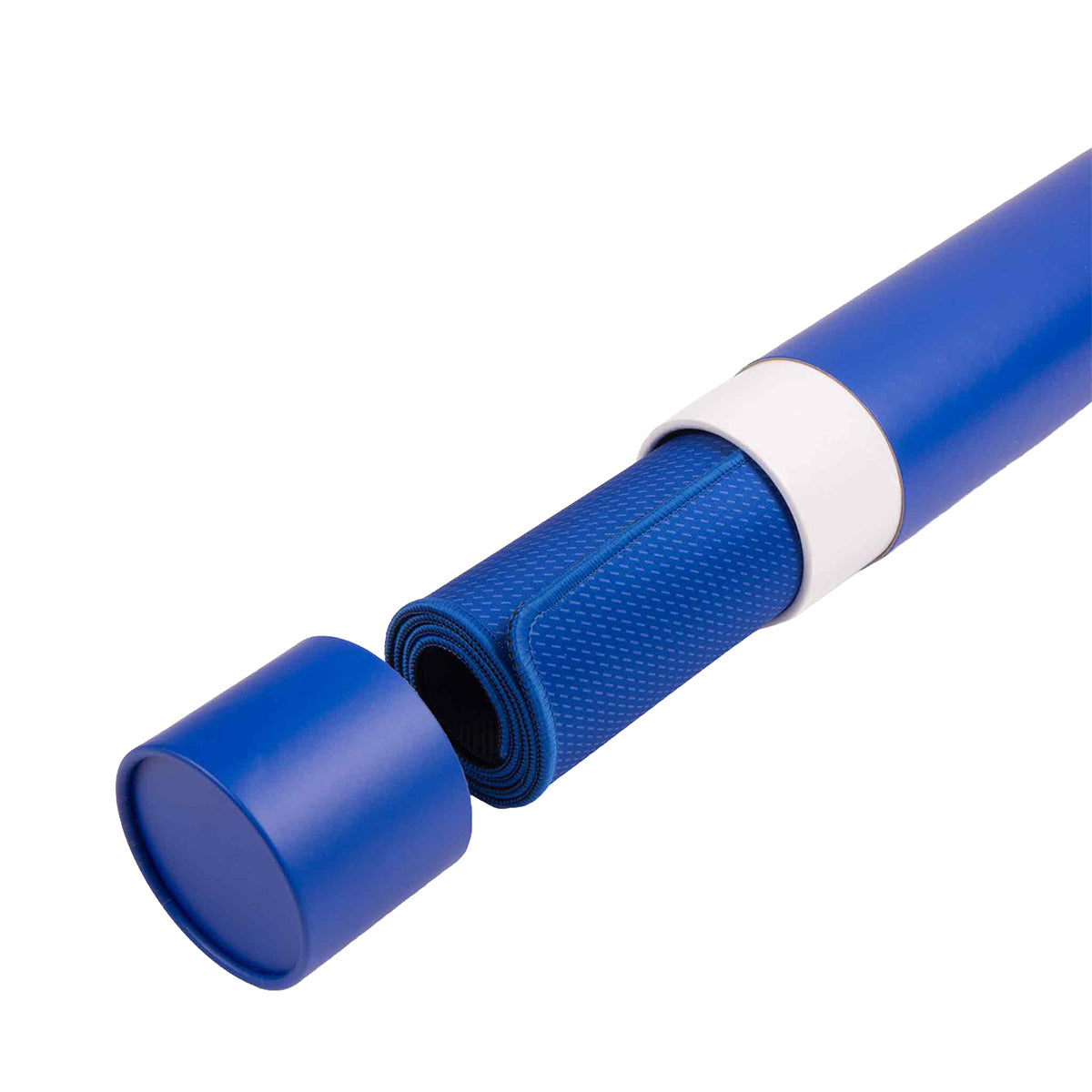 A Boeing Signature Royal Desk Pad featuring a subtle royal cloud design is partially slid out from its matching blue cylindrical carrying case, the cap removed and placed nearby.