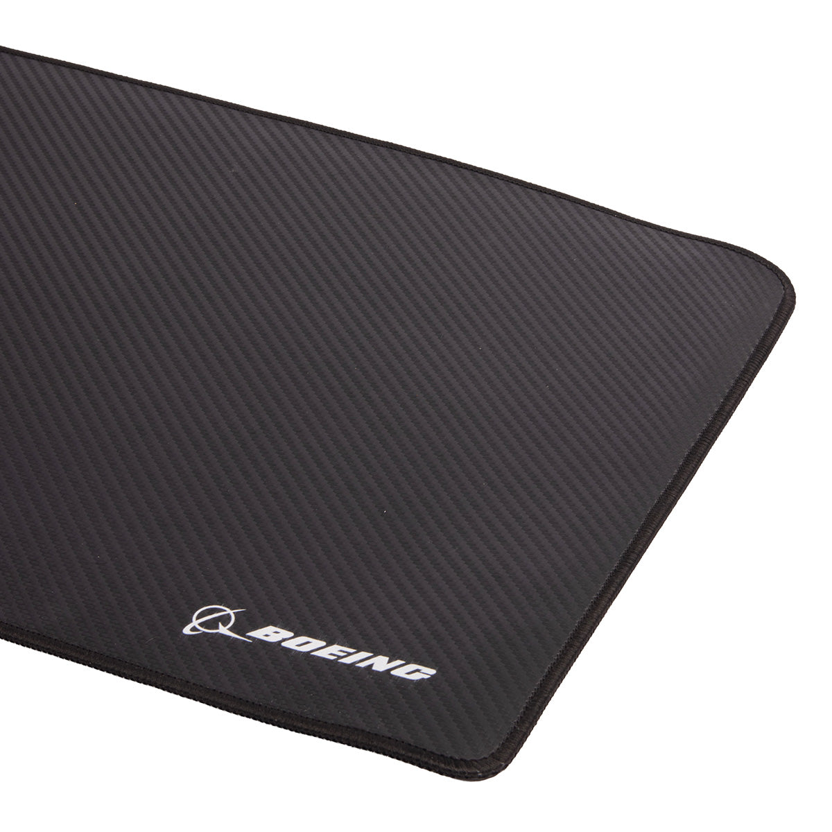 Introducing the Boeing Signature Carbon Fiber Desk Pad by BOEING, featuring a black textured PU carbon fiber design and a white Boeing logo in the bottom corner.