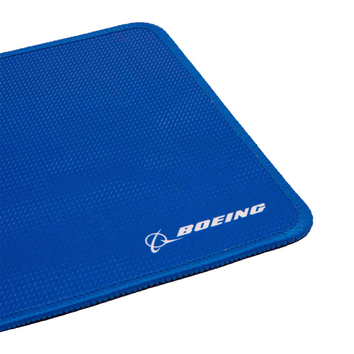 A close-up of the Boeing Signature Royal Mouse Pad by BOEING, featuring a blue rectangular design with a textured surface. The white Boeing logo and name are printed in one corner, emphasizing the mouse pad’s professional look and non-slip grip.