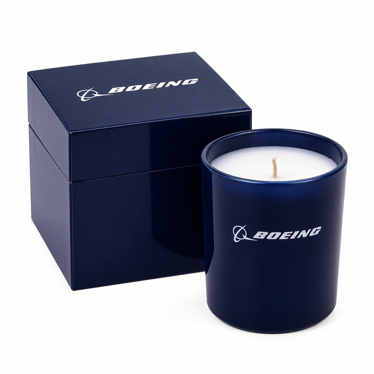A dark blue Boeing 2026 Signature Candle and its matching square gift box, both featuring a white logo.