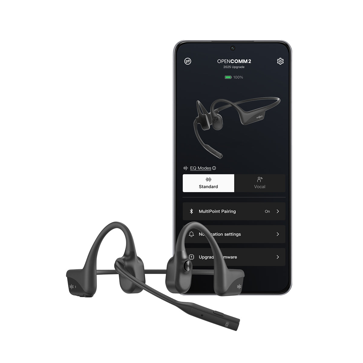The Boeing Shokz OpenRun Pro 2 Headphones with boom mic and AI noise reduction are placed before a smartphone showing settings such as device name, battery level, and audio modes.