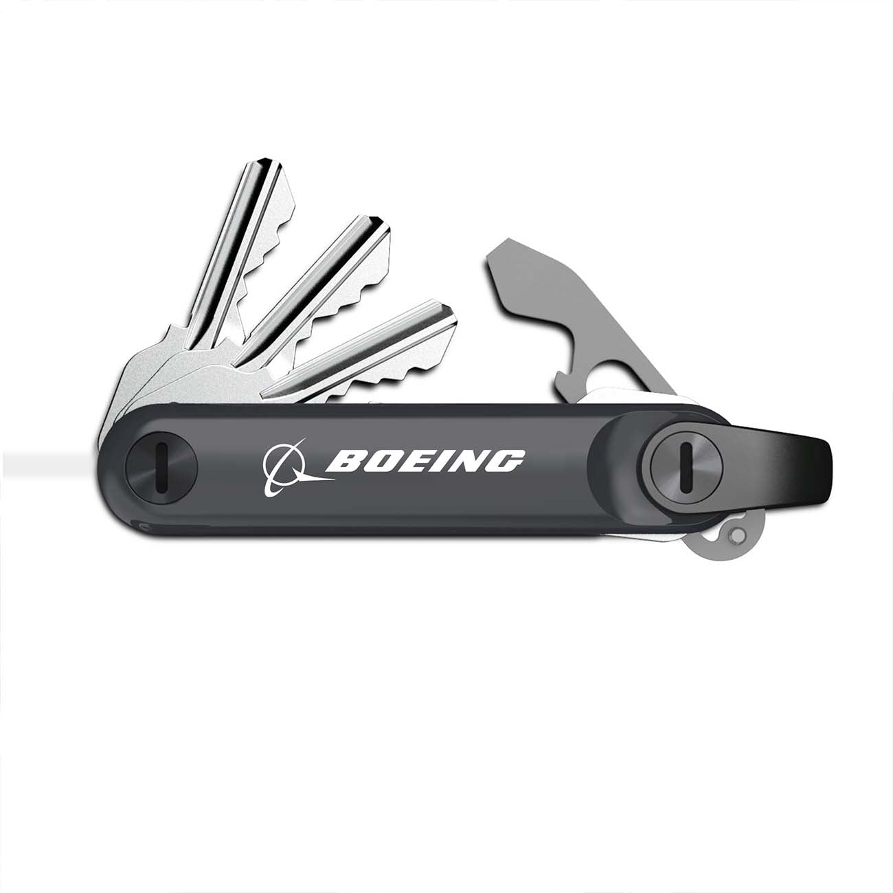 The Boeing Stores Boeing Keysmart Max is a black multi-tool key organizer with silver keys extended, featuring a bottle opener, the Boeing logo, and Bluetooth range to prevent lost keys.
