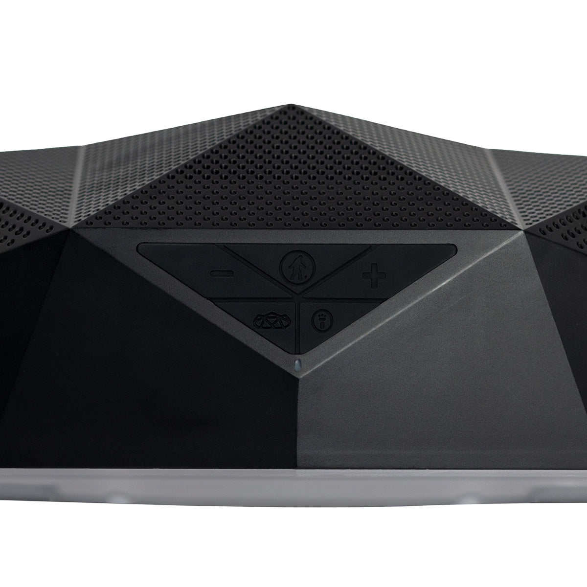 Close-up of the BOEING Outdoor Tech Boeing Rugged Range Speaker—a black, geometric, pyramid-shaped Bluetooth speaker with a textured surface, front control buttons, waterproof protection, and 360° sound design.