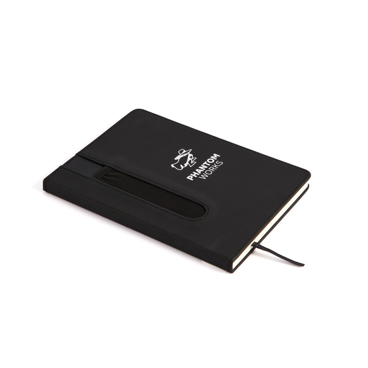 The Boeing Phantom Works Notebook from The Boeing Store features the iconic logo and text on the cover, an attached pen holder, and a ribbon bookmark. Perfect for aviation enthusiasts, its photographed closed and slightly angled on a crisp white background.