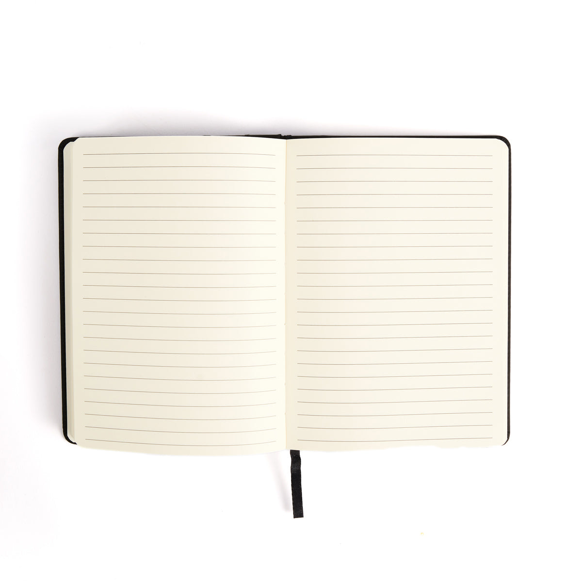 The Boeing Stores Boeing Phantom Works Notebook features an open lined design with a black spine, lying flat on white. An ivory page with horizontal lines and a black ribbon bookmark at the bottom creates the perfect space for aviation enthusiasts to jot thoughts inspired by Boeing designs.