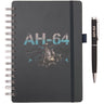 Boeing AH-64 Apache Graphic Notebook Pen Set featuring a spiral-bound black notebook with an AH-64 Apache illustration and a matching black pen labeled AH-64.