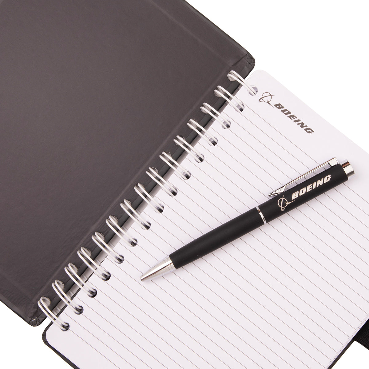 Boeing MQ-28 Ghost Bat Graphic Notebook Pen Set featuring a spiral-bound notebook with lined pages and a matching black ballpoint pen.