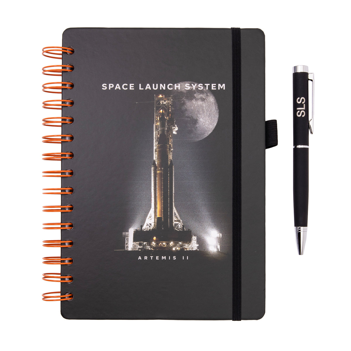 Boeing SLS Artemis II Graphic Notebook Pen Set featuring a spiral-bound notebook with a Space Launch System Artemis II rocket graphic and a matching black pen labeled SLS.
