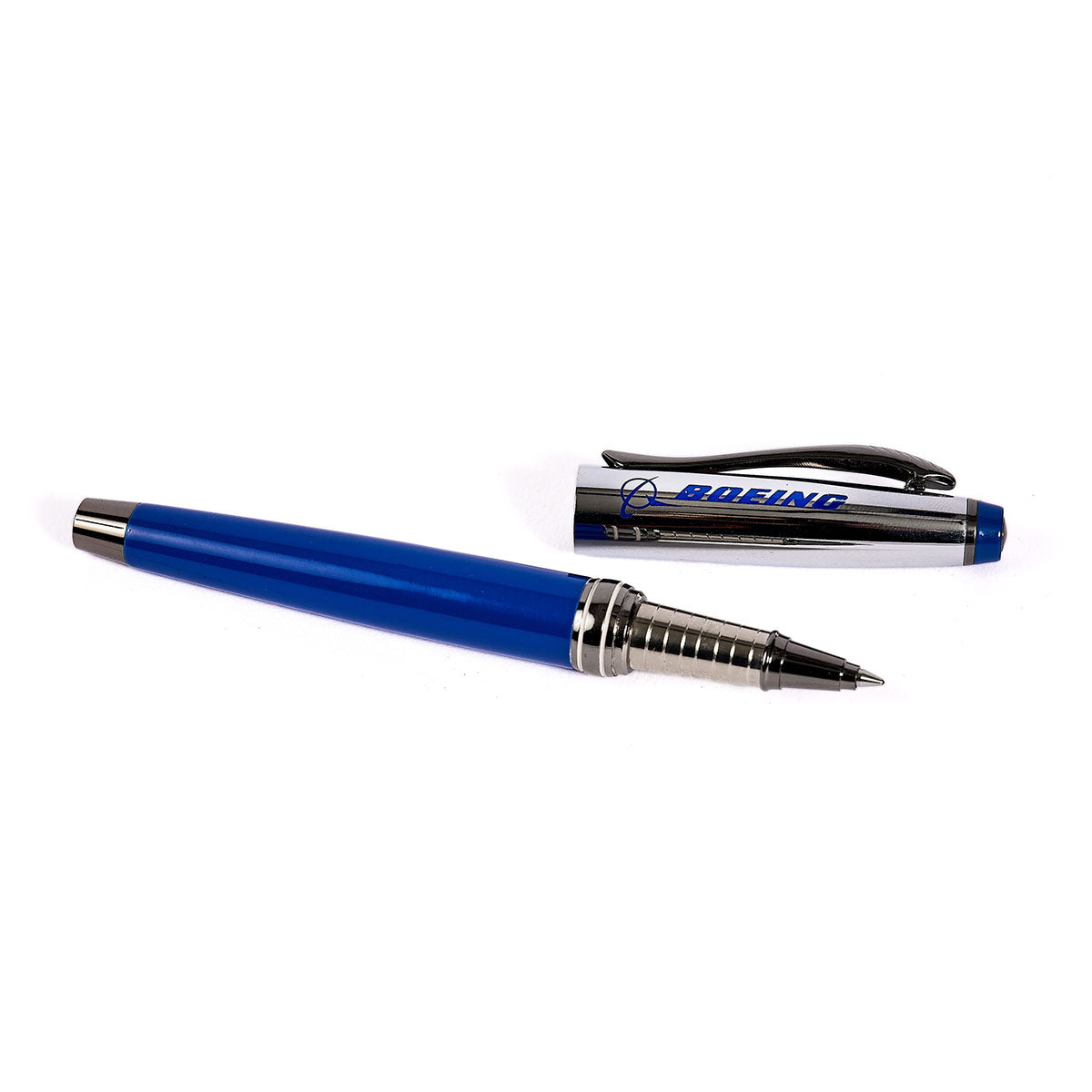 The Boeing Store’s Boeing Leaf Rollerball Pen features blue and silver brass, a cap with the Boeing logo in blue placed beside it, and a visible tip ready to write with its German-made refill.