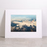 The Boeing E-7 AEW&C Matted Print – Large features a striking image of a U.S. Air Force aircraft soaring above clouds and land, with the Boeing logo embossed on the white mat for an elegant finish.
