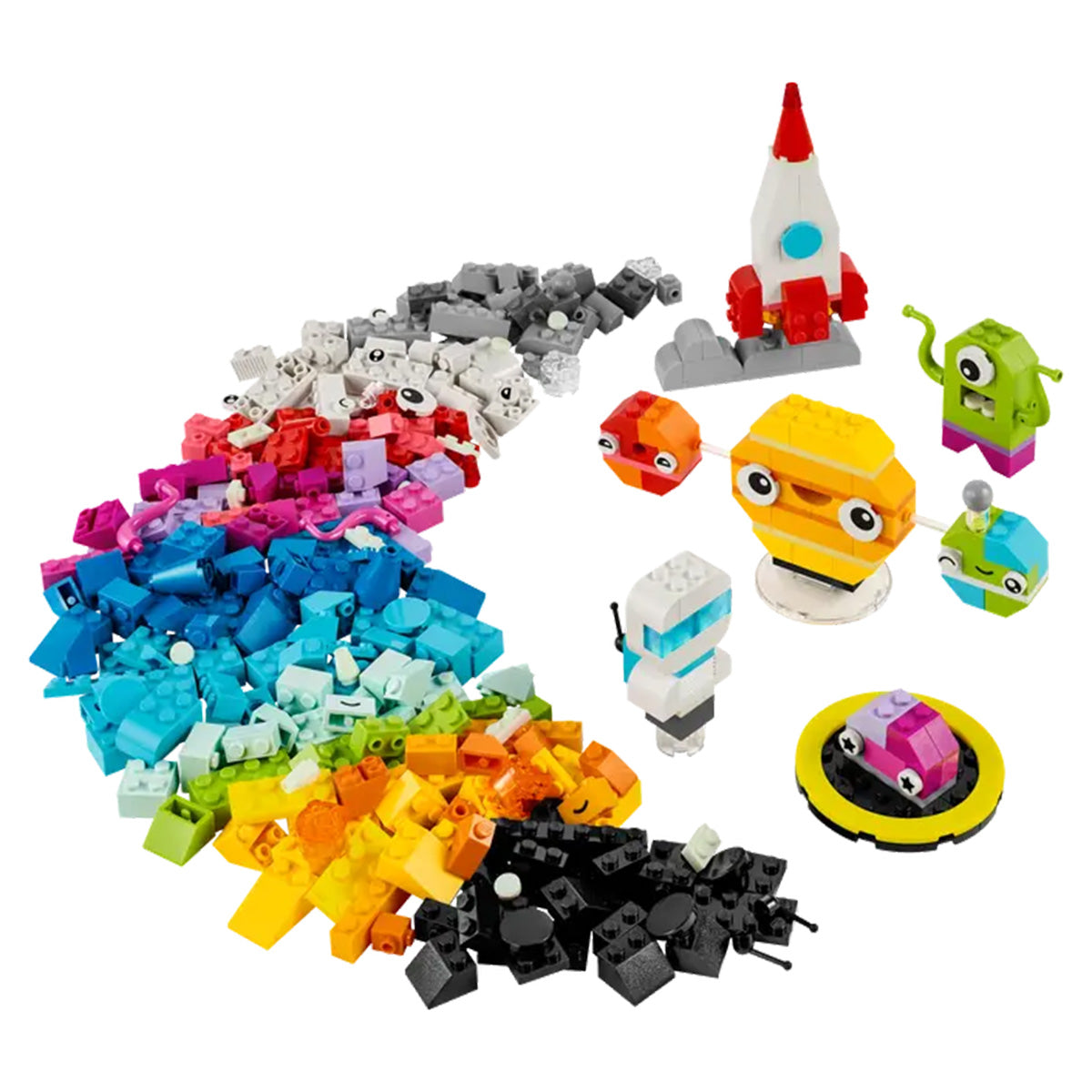 The LEGO® Creative Space Planets set by LEGO features colorful bricks, including glow-in-the-dark pieces, arranged in a swirl, with assembled figures like a rocket, space shuttle, green alien, robots, and more on the right.