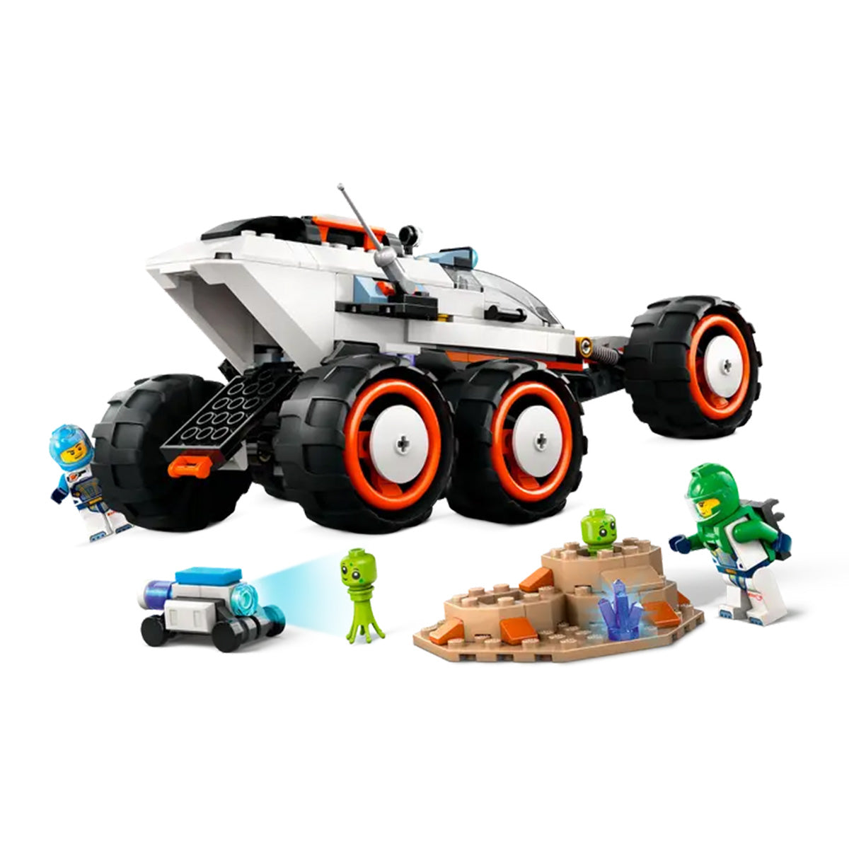 The LEGO® Space Explorer Rover by LEGO features advanced suspension, large wheels, space crew minifigures, two green aliens, a robot, and a sandy terrain with crystals—all built from colorful bricks.