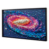Build a vibrant spiral galaxy with the LEGO® The Milky Way Galaxy wall art kit by LEGO, featuring swirling blue, pink, purple, orange, and white arms against a dark blue background in a black frame—an eye-catching home decor gift.