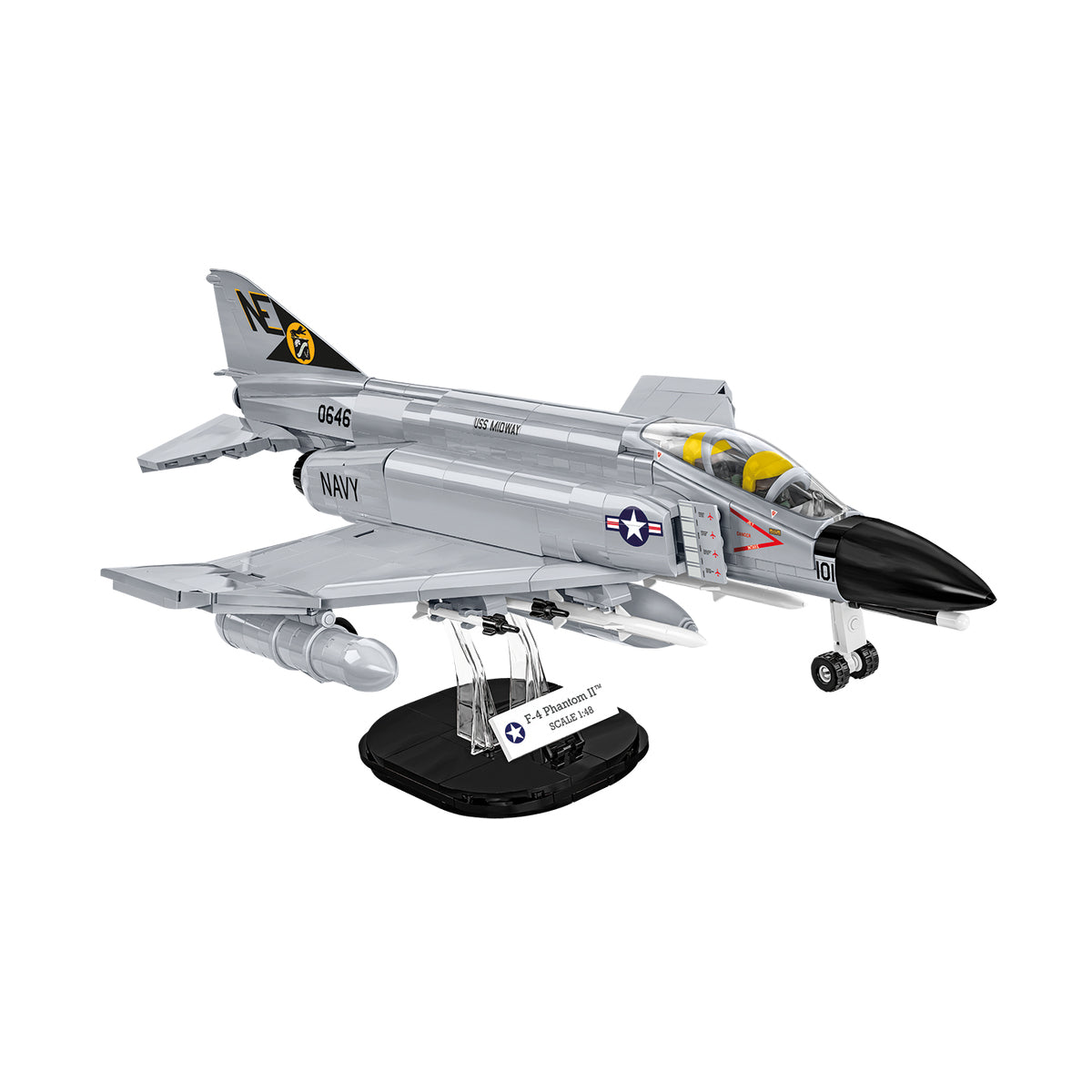 The COBI F-4 Phantom II by BOEING is a 1:48 scale model with gray camouflage, Navy markings, detailed decals, and tail codes. Displayed on a stand, this set includes 703 pieces for an authentic build.