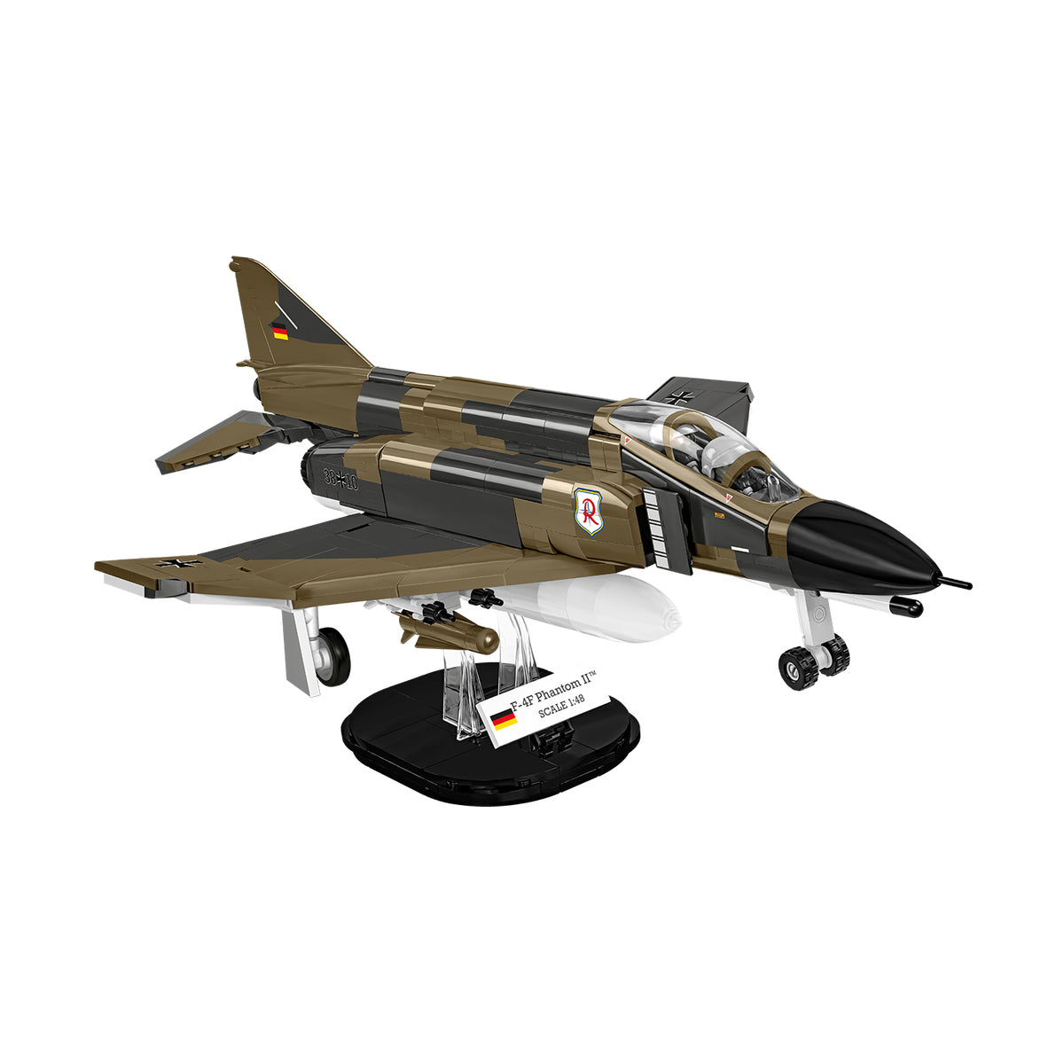 The COBI F-4F Phantom II, by BOEING, features brown, green, and black camouflage and is displayed on a black stand labeled with its name and a German flag.
