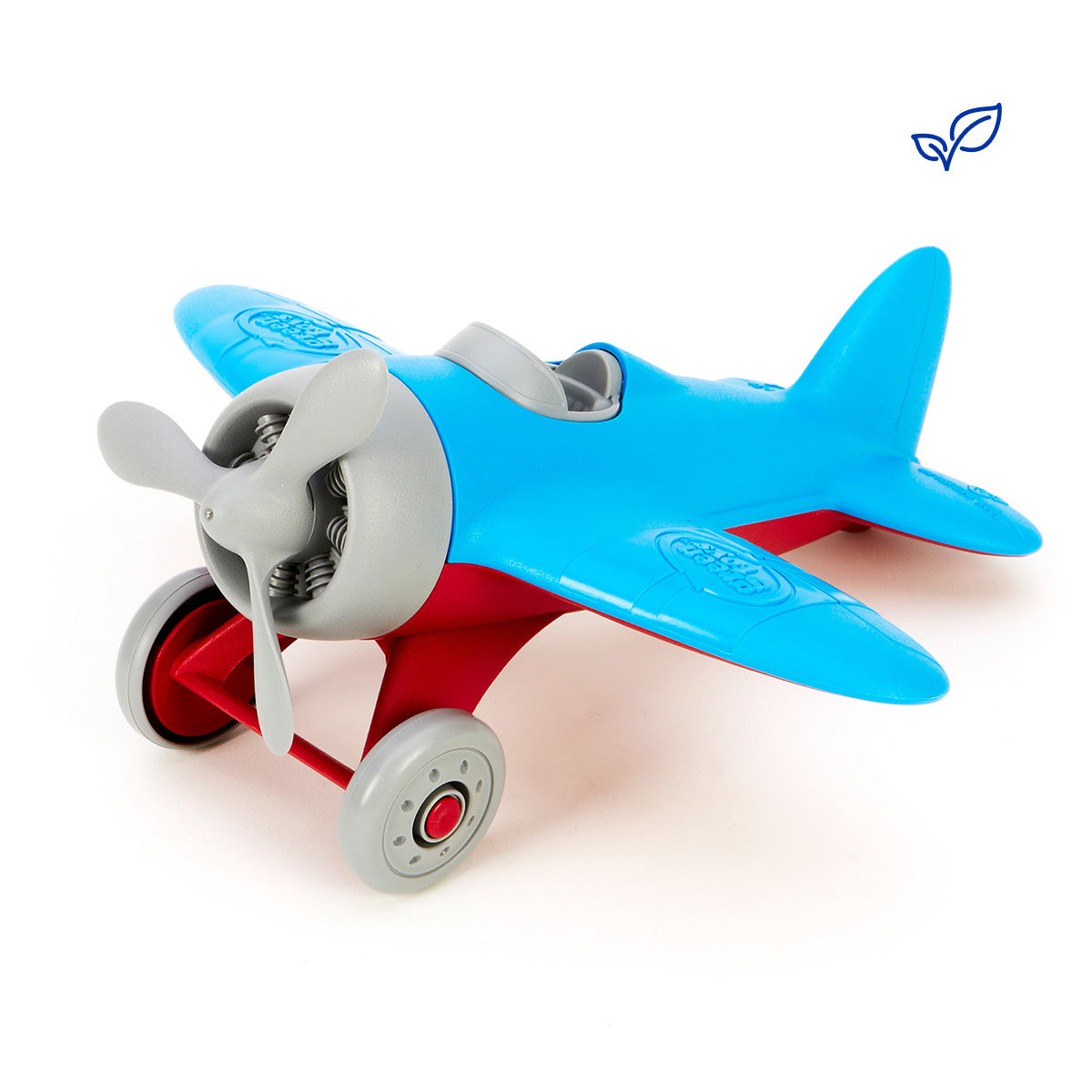The GREEN TOYS Green Toys Airplane - Blue features blue and red colors with a gray propeller and wheels, made from 100% recycled material, displayed on a white background.