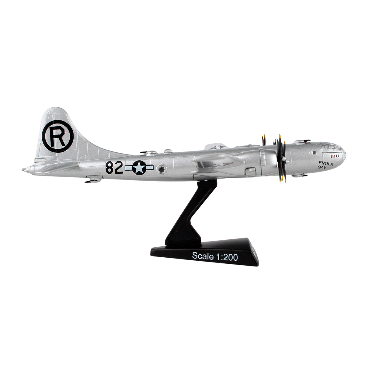 The Daron Boeing B-29 Superfortress Enola Gay Diecast Model is a 1:200 scale silver metal airplane on a black stand, featuring U.S. Air Force markings, "82," a circled "R" on the tail, and four propellers.