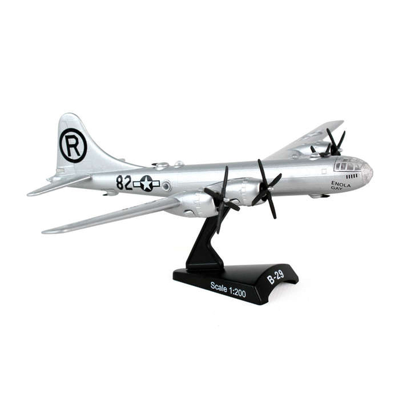The DARON Boeing B-29 Superfortress Enola Gay Diecast Model is a silver, 1:200 scale replica with black propellers and features the marking 82 with star insignia. Mounted on a black stand labeled B-29, its tail displays a bold black R within a circle.