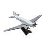 The DARON Boeing C-47 Skytrain United States of America Diecast Model is a 1:144 scale replica, painted white and gray with UNITED STATES OF AMERICA on the fuselage, and comes mounted on a black stand.