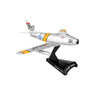 The DARON Boeing F-86F Sabre Mig Mad Marine Diecast Model features silver, yellow, and black USAF/FU-584 markings on a black F-86F Sabre Scale 1:110 stand—ideal for military aviation fans.