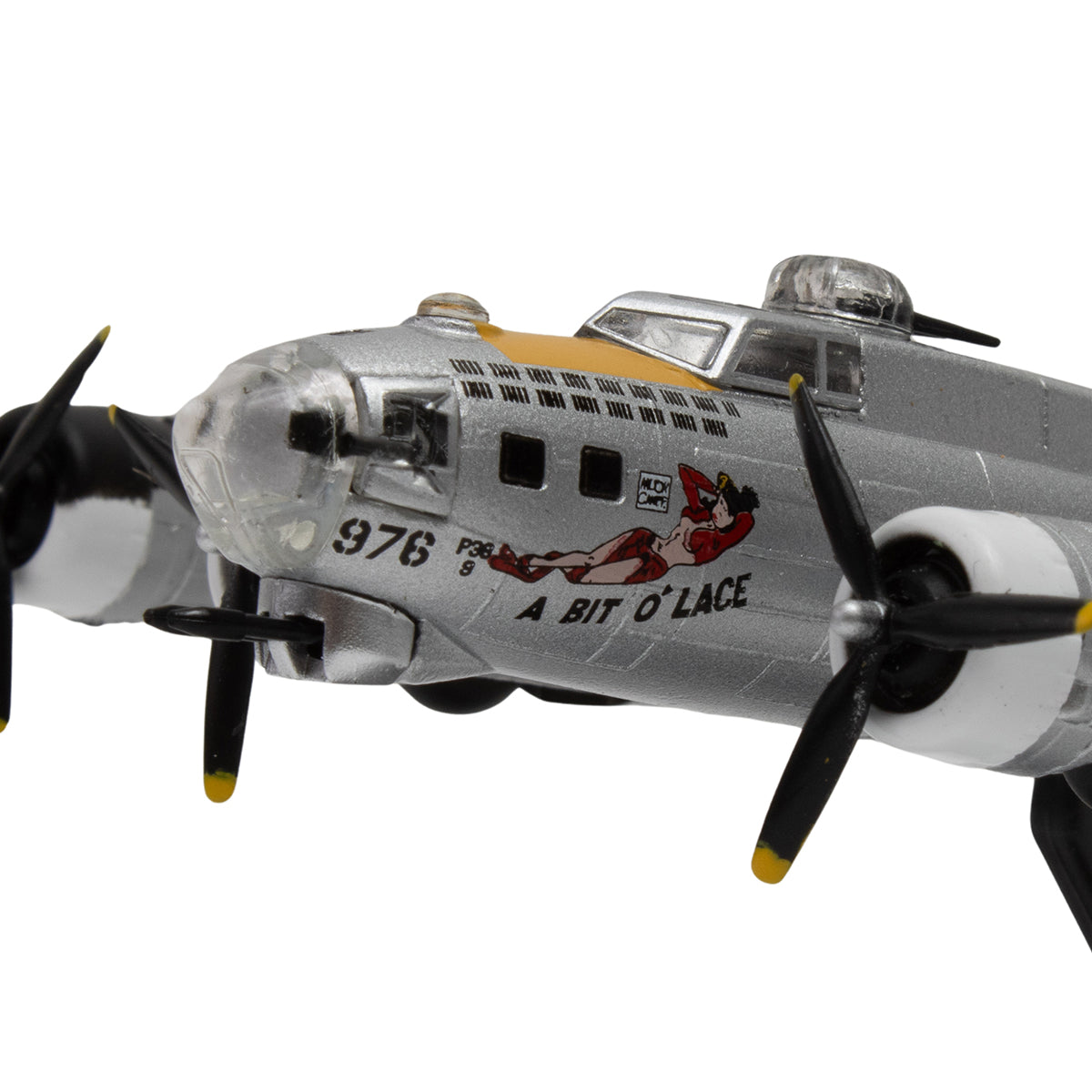 Close-up of DARON's Boeing B-17G Flying Fortress "A Bit O'Lace" diecast model in 1:155 scale, featuring black/yellow propellers, pin-up nose art, text "A Bit O'Lace," and the number 976 on the fuselage.