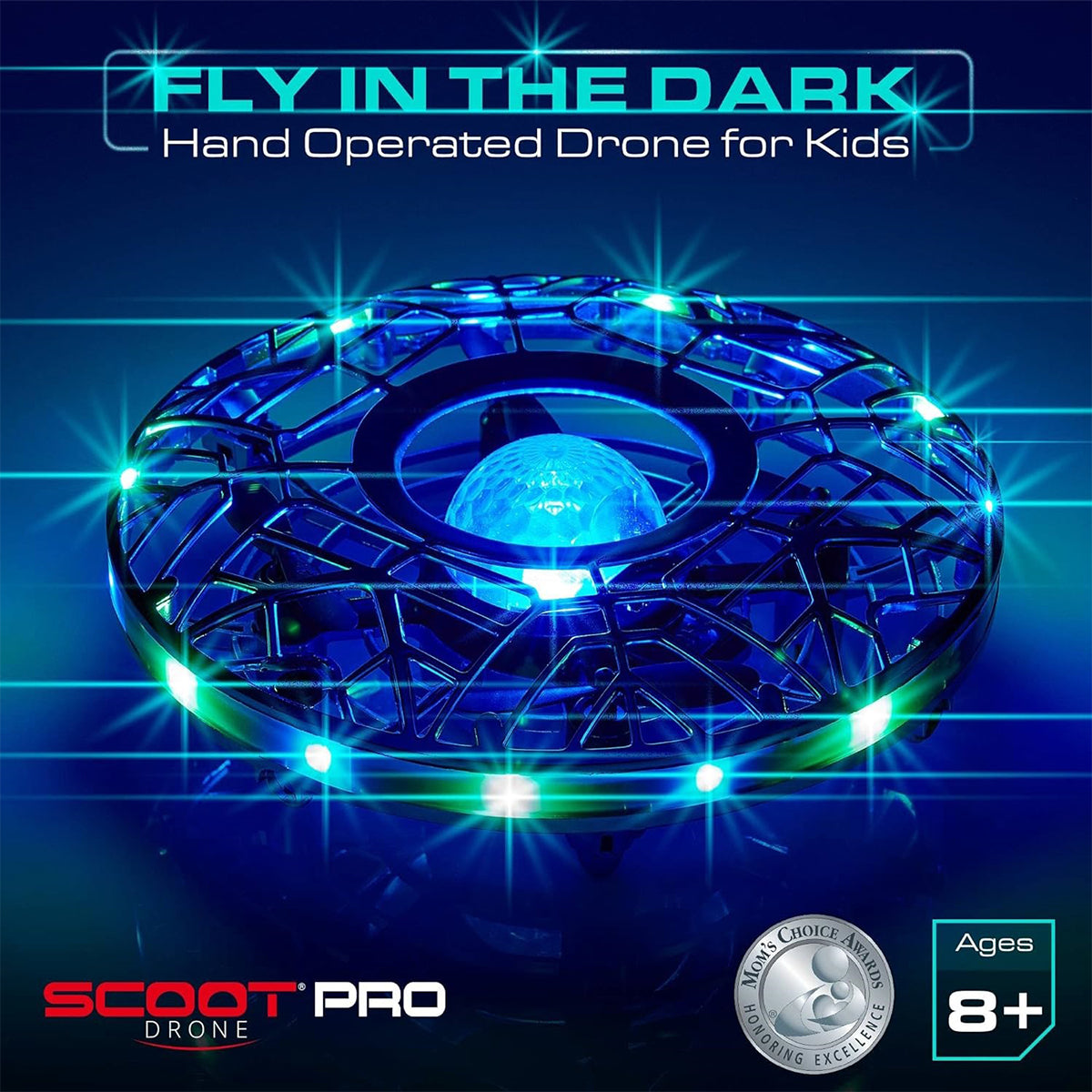 Force1 Scoot Pro Drone by Boeing is a mini, circular drone with glowing blue and green lights and a futuristic design. Equipped with sensor technology for hands-free fun, it suits kids aged 8+. It also boasts a Moms Choice Award badge.